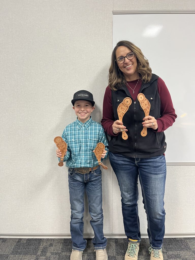 Mindy and Son making Spur Straps